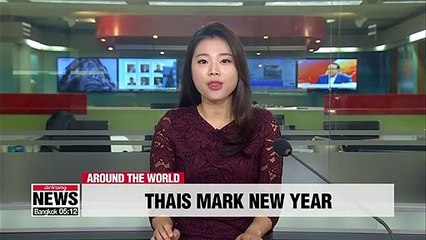 Water fight between elephants and people marks Thai New Year