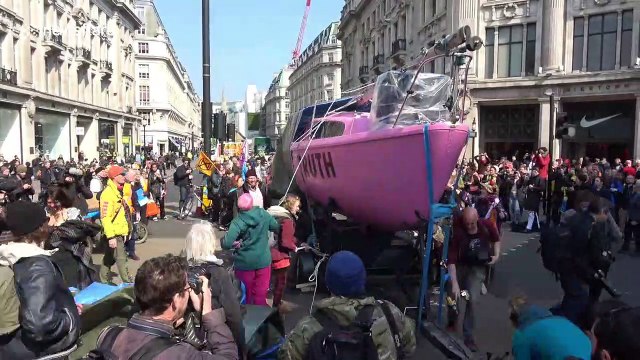 Climate change protesters bring London's Oxford Circus to standstill with pink boat