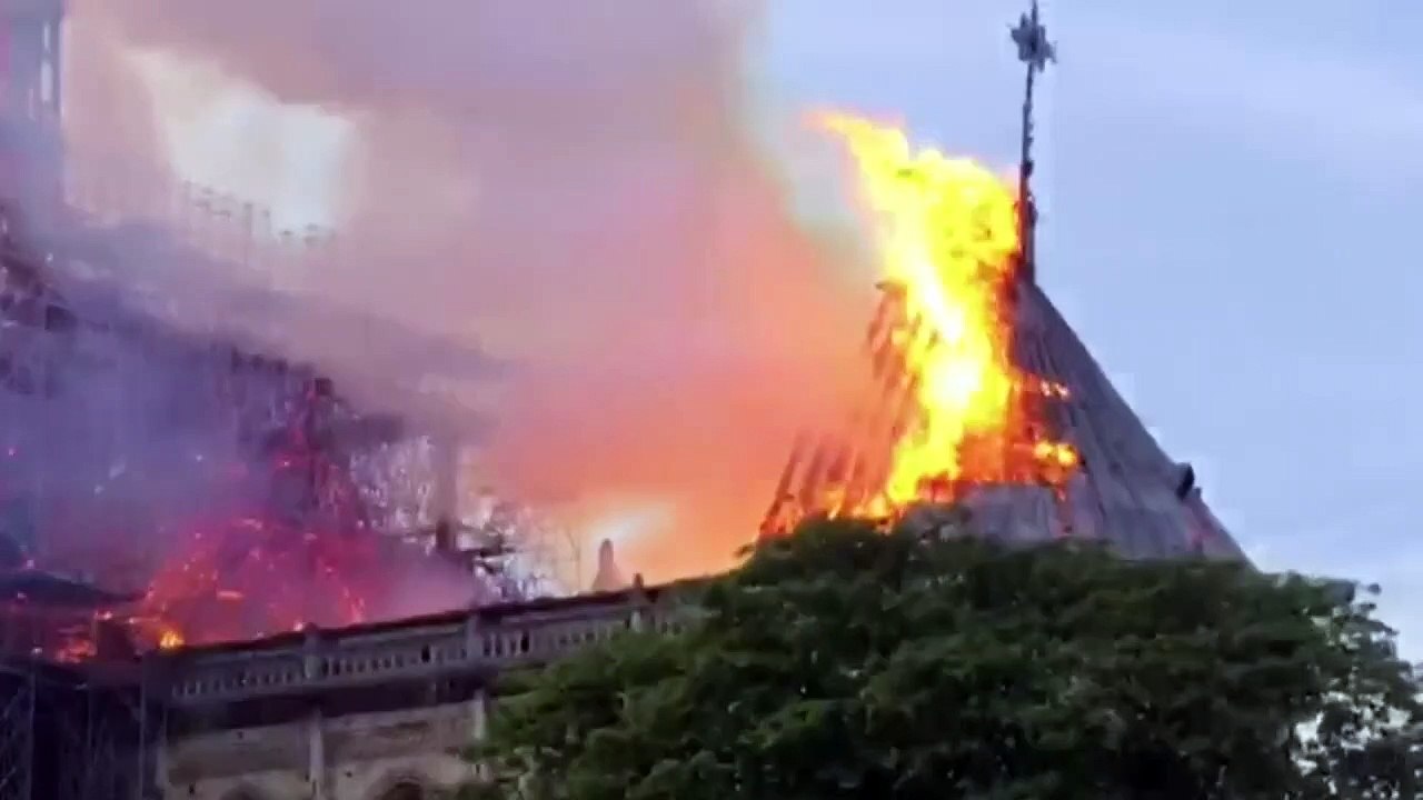 Notre-Dame: Fire under control as Macron pledges to rebuild