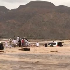 Family Rescued After Car Swept Away By Flood