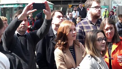 Climate change activists forcibly removed from London's Canary Wharf station