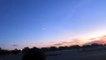 Meteor Streaks Across Sunrise Sky