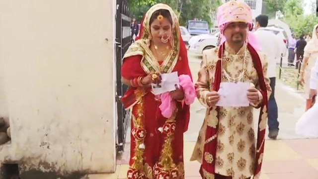 Lok Sabha Elections 2019: Newly-married couple turn up for voting in J&K’s Udhampur | Oneindia News