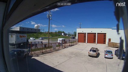 Car Avoids Truck, Slides into Building