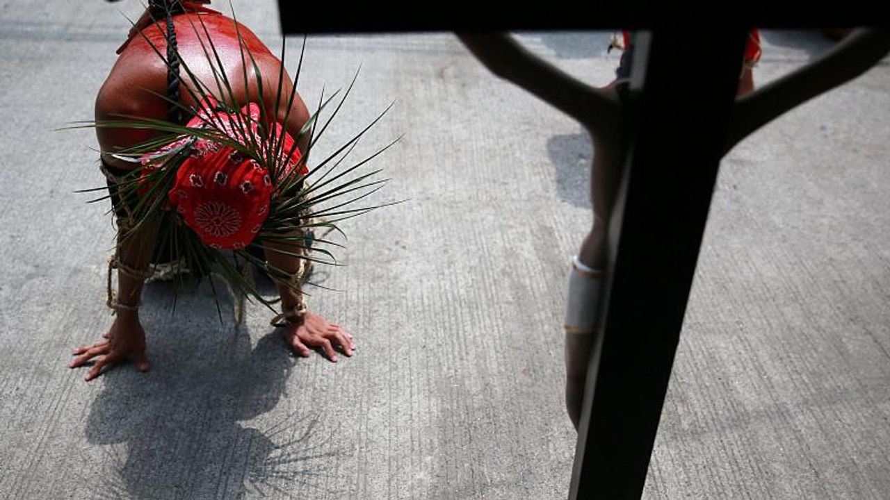 Catholic devotees in the Philippines self-flagellate on Holy Thursday
