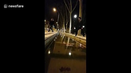 Girl gets fully soaked after massive leap-fail