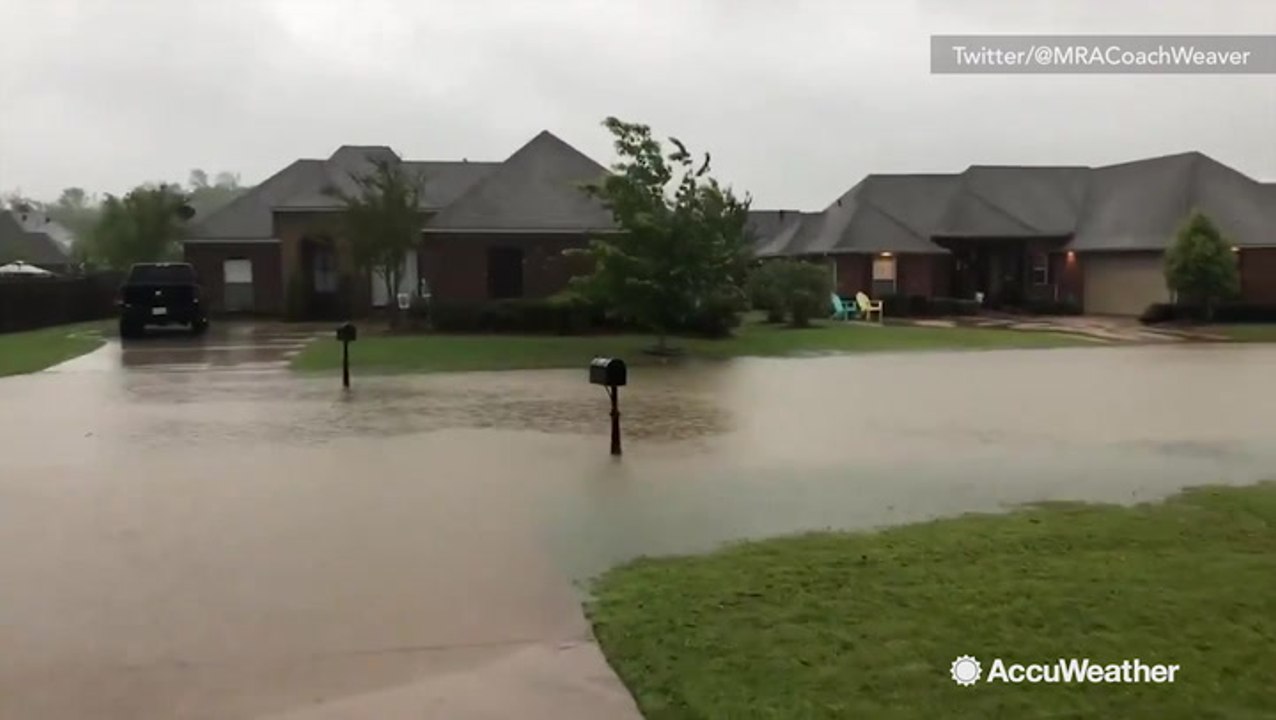 Homes and streets overwhelmed by flooding durin...