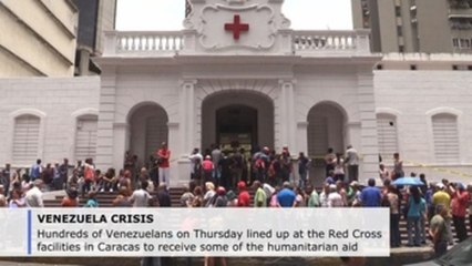 Long lines once again in Caracas, this time for humanitarian aid