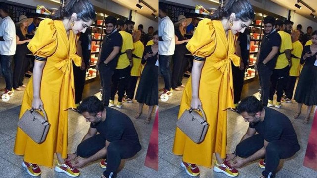 Sonam Kapoor's husband Anand Ahuja ties her shoelace in front of media; Check Out | FilmiBeat