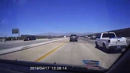 Loose Ladder Launches into Car Windshield