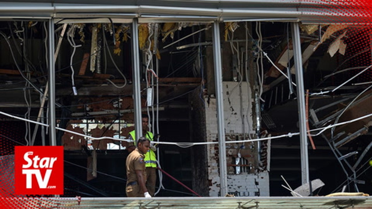 At least 138 people dead as blasts hit Sri Lank...
