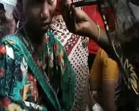 young Lady barber shaves lady head