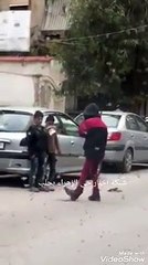 لأطفال في أحد شوارع وسط حلب بالأمس وهم يستنشقون "الشعلة"