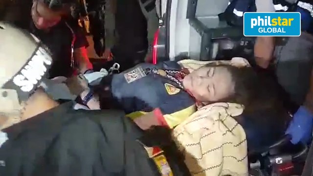 Rescuers transport a survivor in the Chuzon Supermarket collapse to Jose Songco Lapid District Hospital in Porac, Pampanga