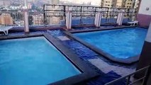 Swimming pools on tower block shake as earthquake hits the Philippines