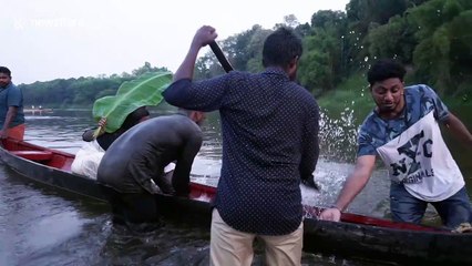 Indian couple end up falling into river trying to get perfect wedding photo