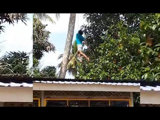Remaja nyaris maut leher terbelit, tergantung di pokok kelapa