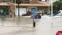 UK tourist spots cars wading through deep water as Spanish town flooded