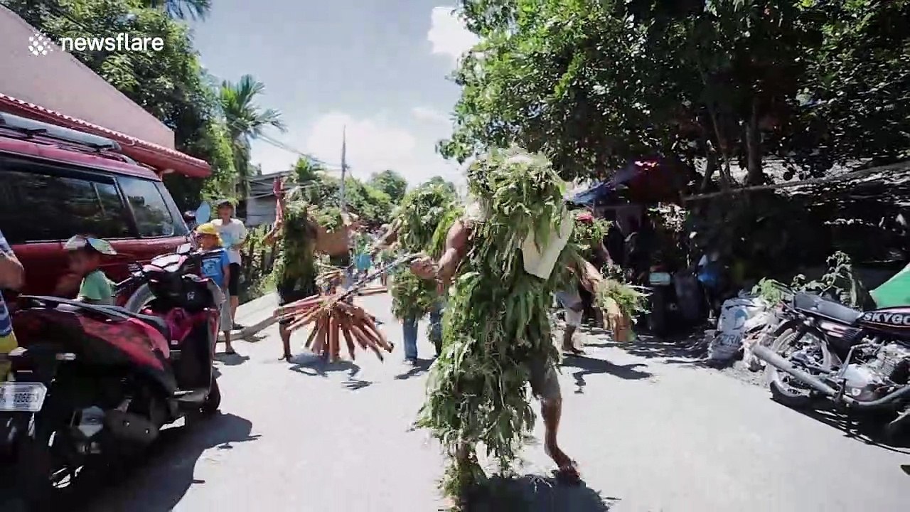 Catholics lash themselves in bizarre religious procession