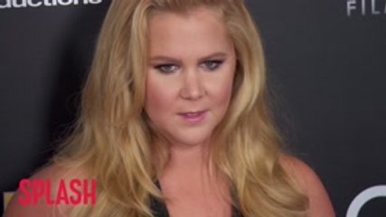 Amy Schumer Confirms She Is 'Still Pregnant And Puking'
