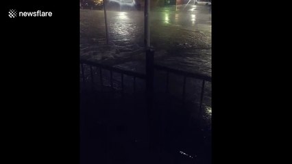 Tải video: Street transformed into raging torrent during North Texas floods