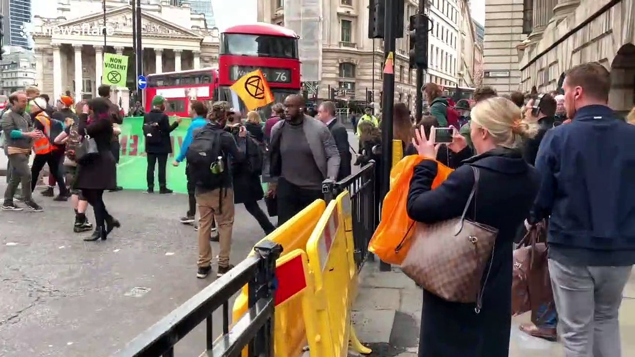 Extinction Rebellion protesters block traffic outside Bank of England in London