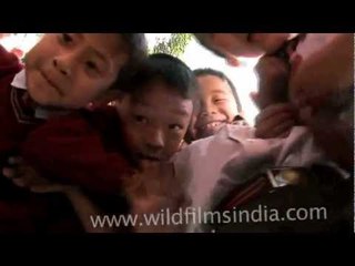 Mizo kids turn aggressive for camera with funny faces!