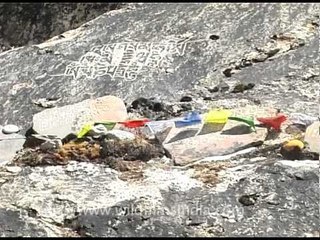 Carved letters on rocks indicating successful climbers of Mt Everest!