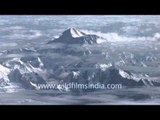 Cloud covered high peaks of Nepal as seen from the air