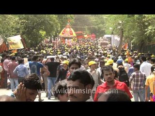 Hands in the air for the Rath Yatra, Delhi...
