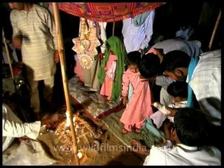 Crying baby bride and grooms in India