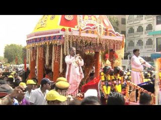 Gurus with followers and chariot during Rath Yatra, Delhi