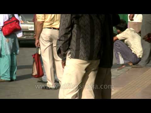 Scratching one's crotch in public?