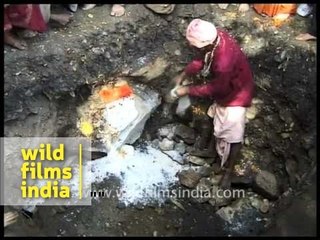 Holy man in India ends his journey in a sitting position