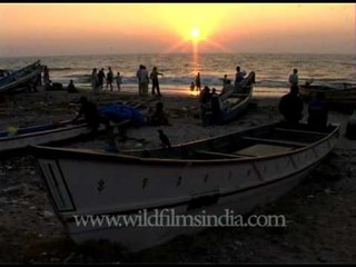 Fishermen in Kerala while away time on the beach