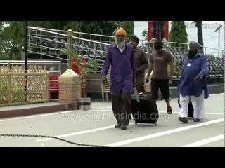 Indian musicians returning from Pakistan after a concert