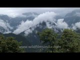 Puffy masses of monsoon clouds envelope the mountains of Sikkim