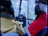 Landscape views of a Himalayan hill station from a helicopter cockpit