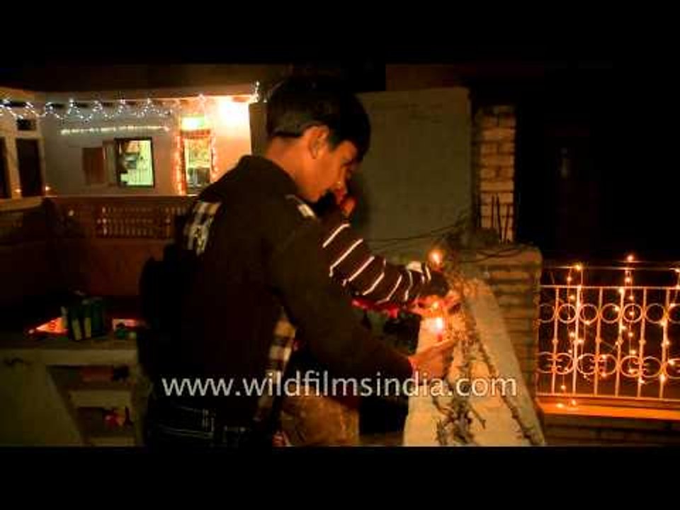 Kids lighting up candles on Diwali at Fatehpur Beri, Delhi
