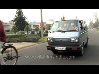 Tallest woman from Meerut in the front seat with her kid!