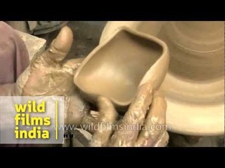 Making clay lamps or diyas for Diwali!