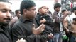 Shia Muslim devotees attend Muharram procession