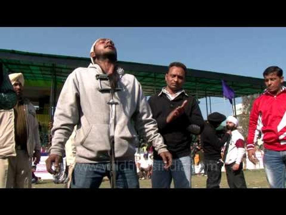 Man weight-lifting with hair - Never seen before