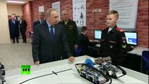 روبوتات تؤدى تمارين رياضية  أمام الرئيس بوتين