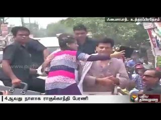 Rahul Gandhi makes way for ambulance during vehicle rally in Uttar Pradesh