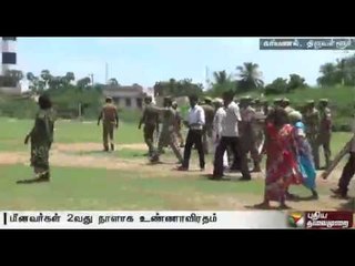 Clash between police and fishermen during a protest in Thiruvallur