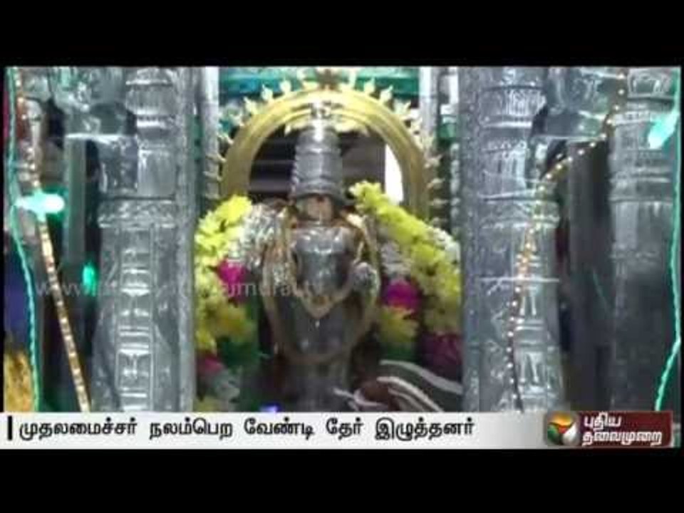 ADMK cadres pull the silver chariot and offer special prayers at Paramakudi for the CM's health
