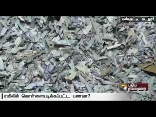 Huge quantities of shredded 100 and 500 rupee notes found in Panrutti