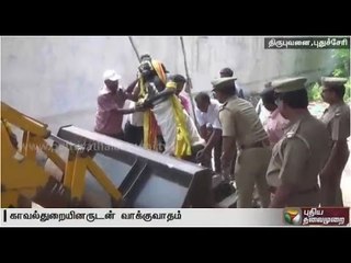 Tussle between the public and police when an effort was made to remove Anjaneyar statue