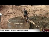 Desilting of wells dug in the river bed, due to lack of water at Theni